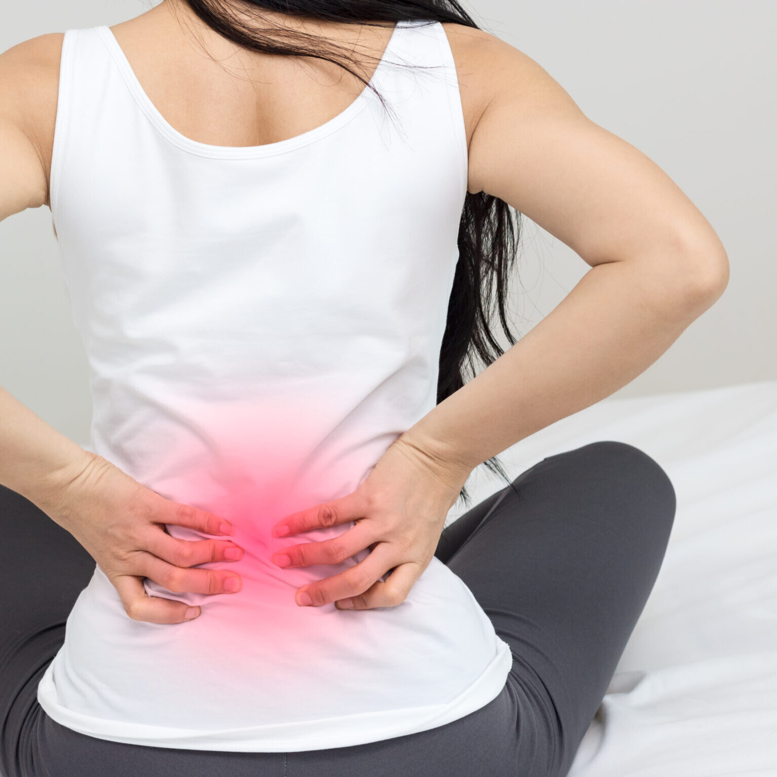 women Back pain after wake up in morning